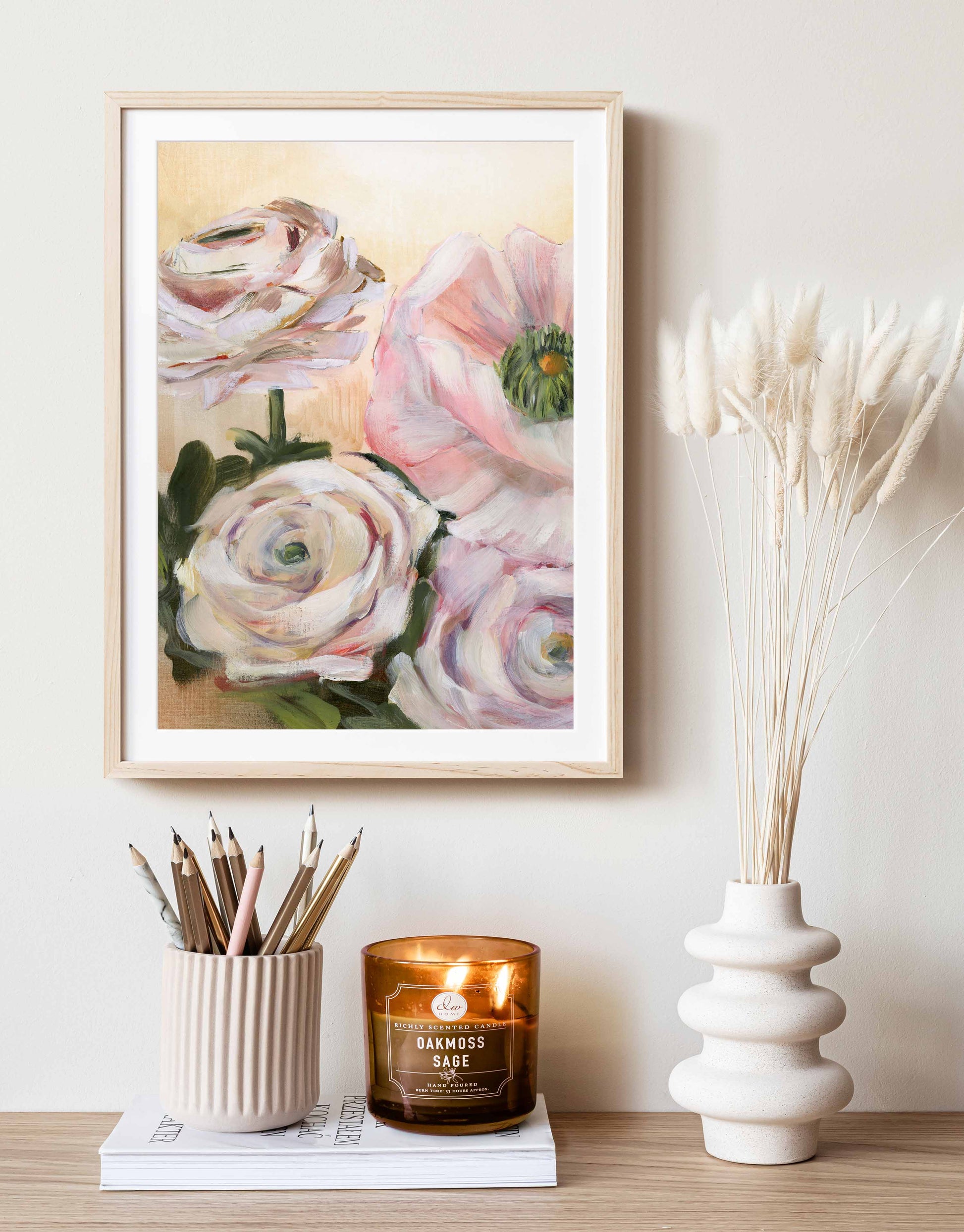 framed floral art print over desk